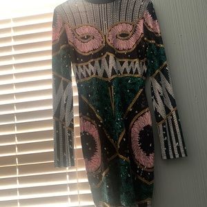 Brand new rhinestone dress never worn.